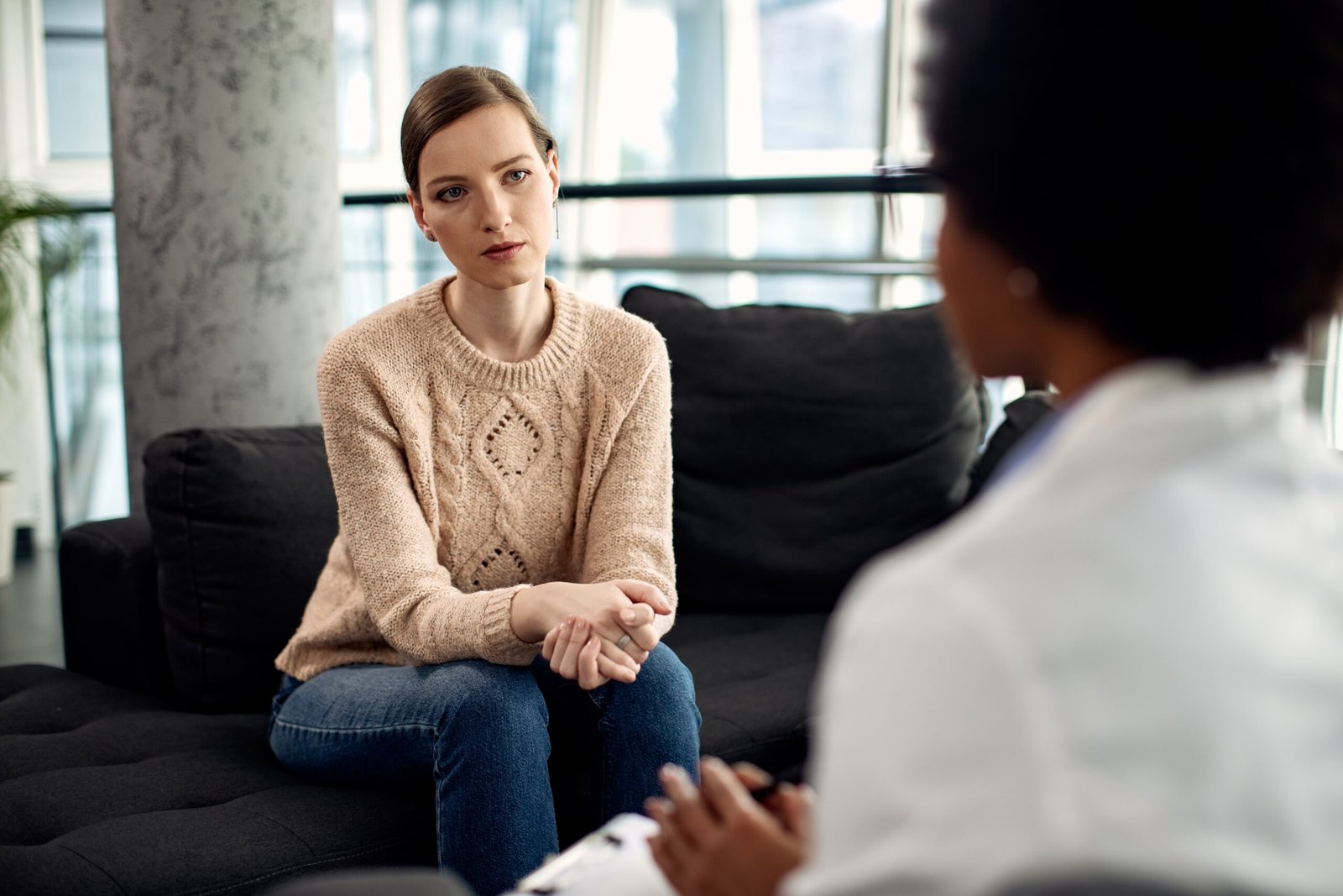 young woman having counseling with psychotherapist 2023 01 20 03 39 52 utc min scaled